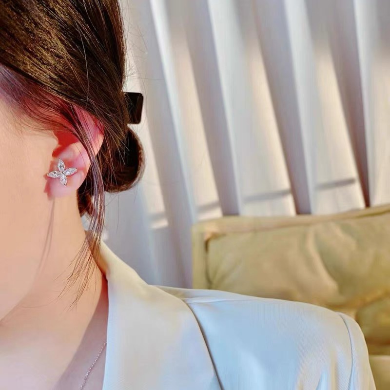 T*f*ny earrings